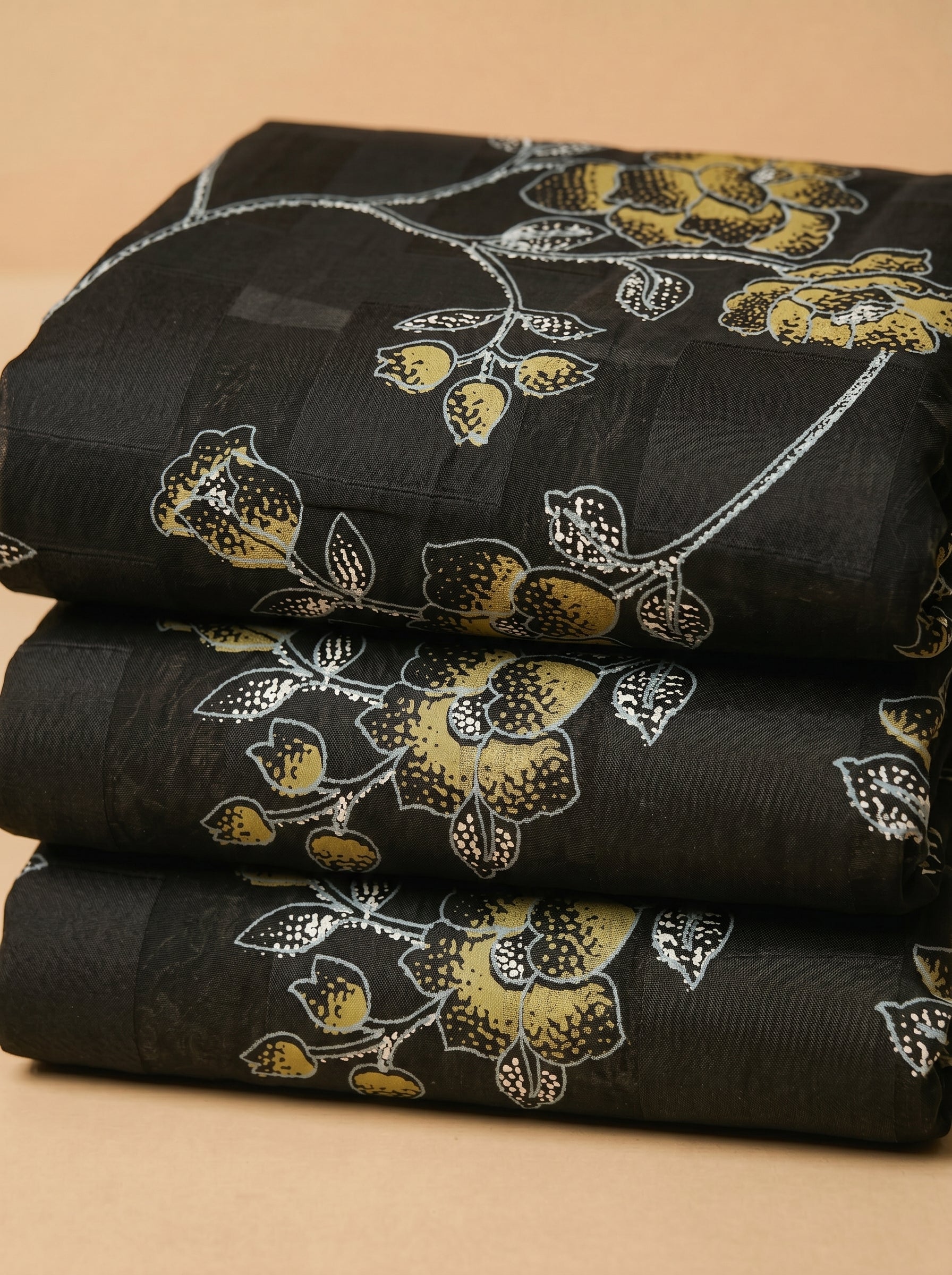 Golden forest florals on deep black Swiss voile