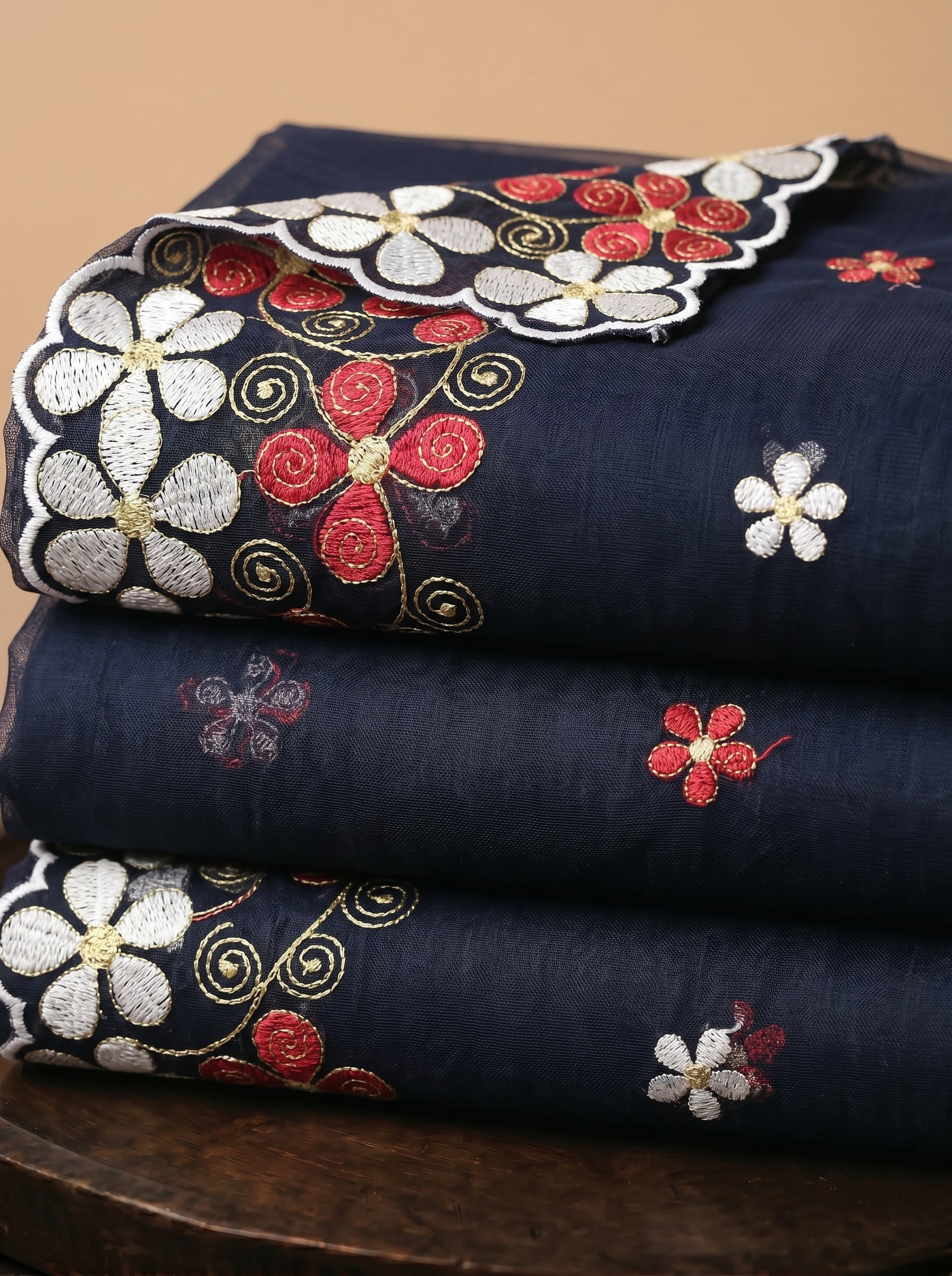 Floral buttas on rich navy Swiss voile