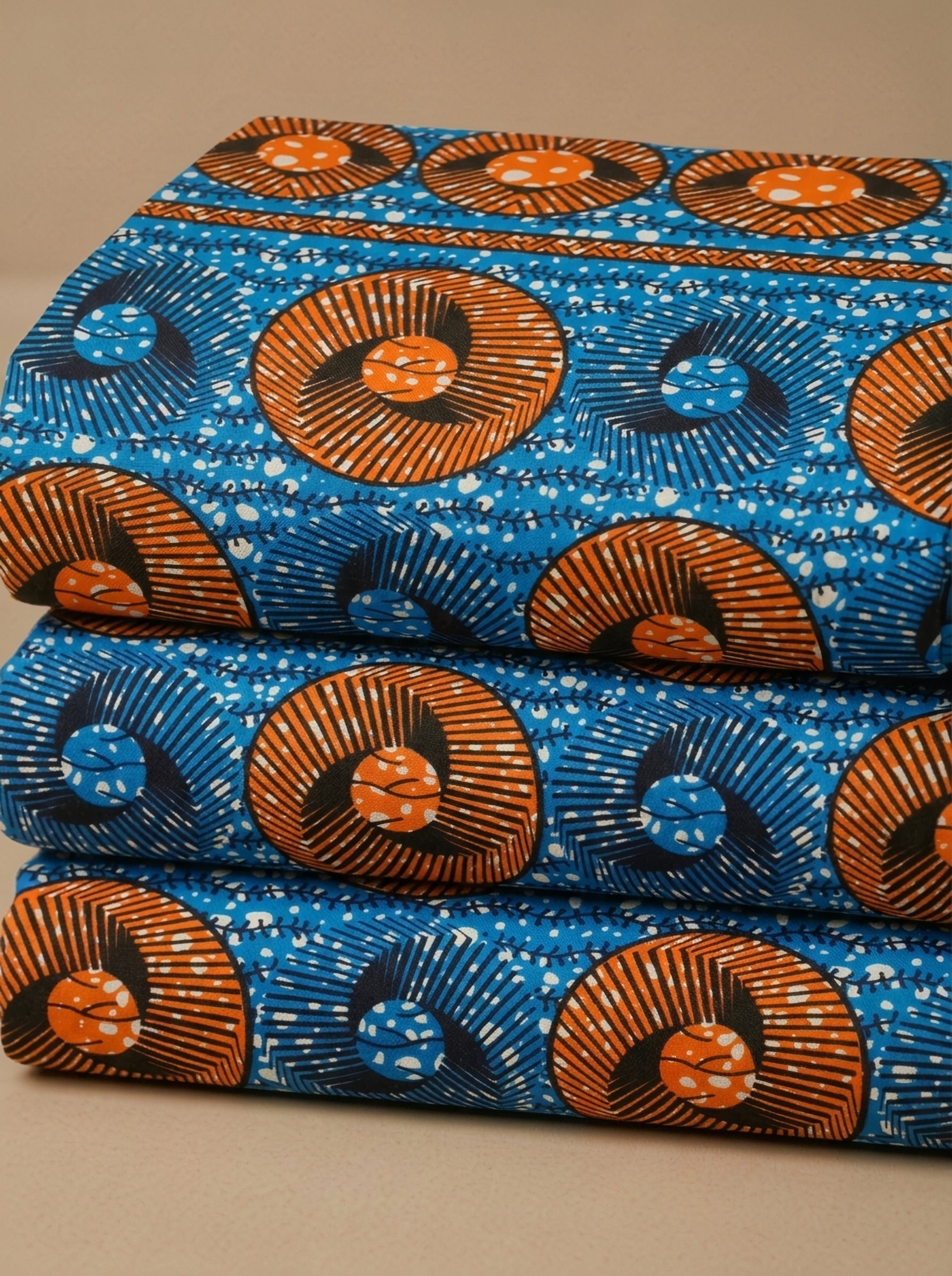 Rusty orange fans on an ocean blue base