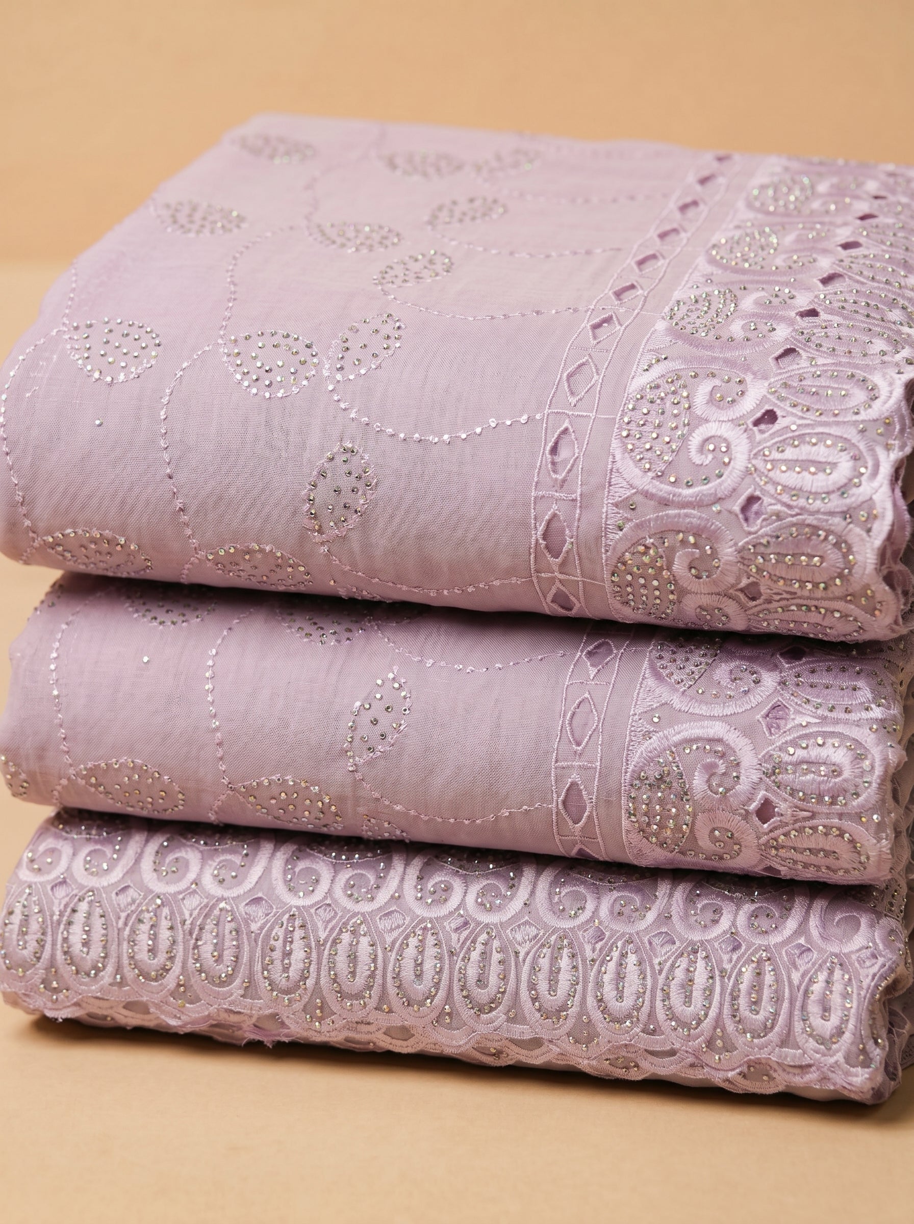 Graceful and glimmering unstitched Swiss Voile from the Lavender Luxe Collection, featuring lush lilac tones
