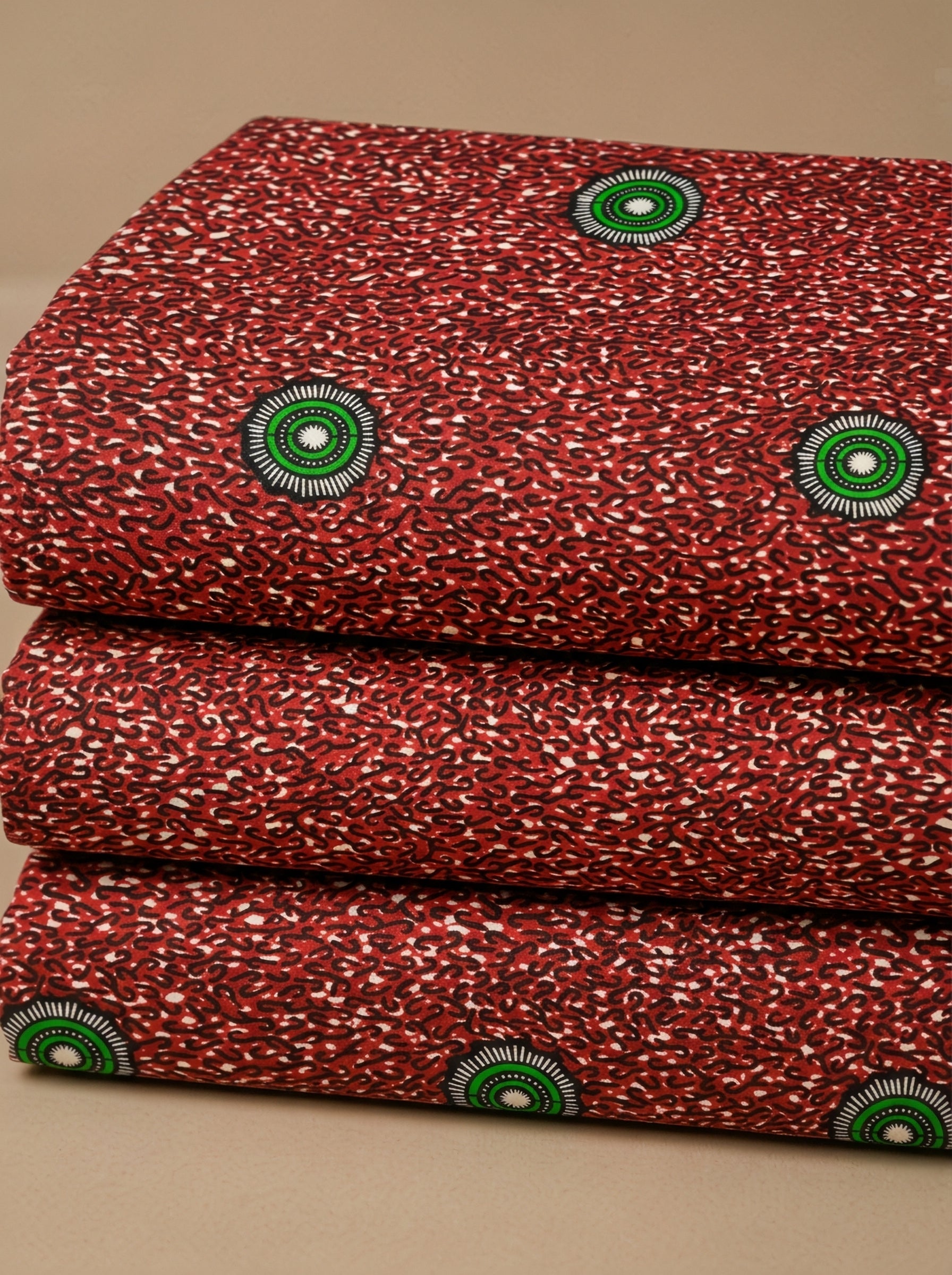 Emerald eyes on a fiery red canvas
