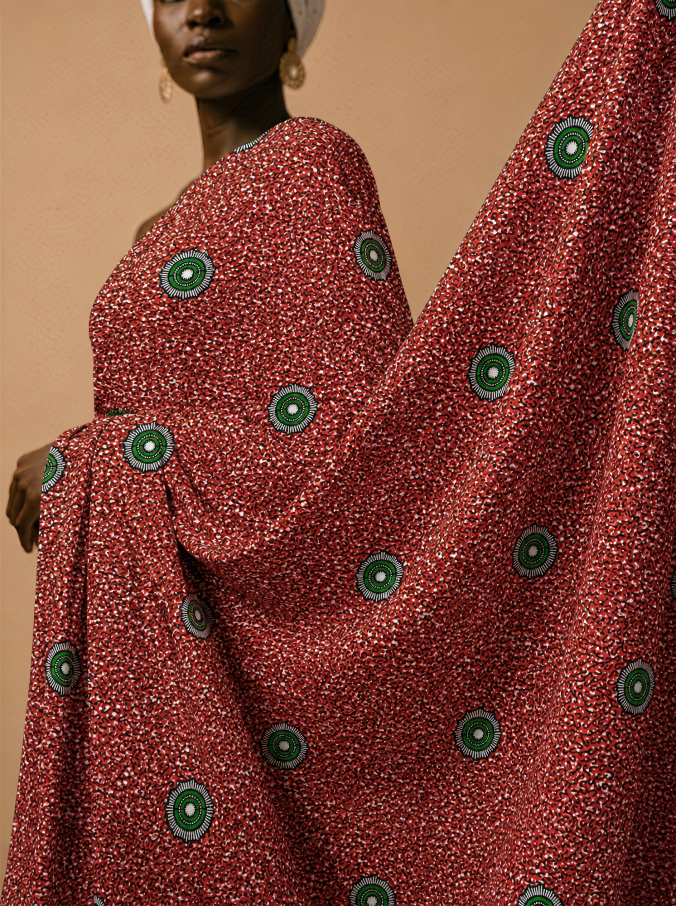 Emerald eyes on a fiery red canvas