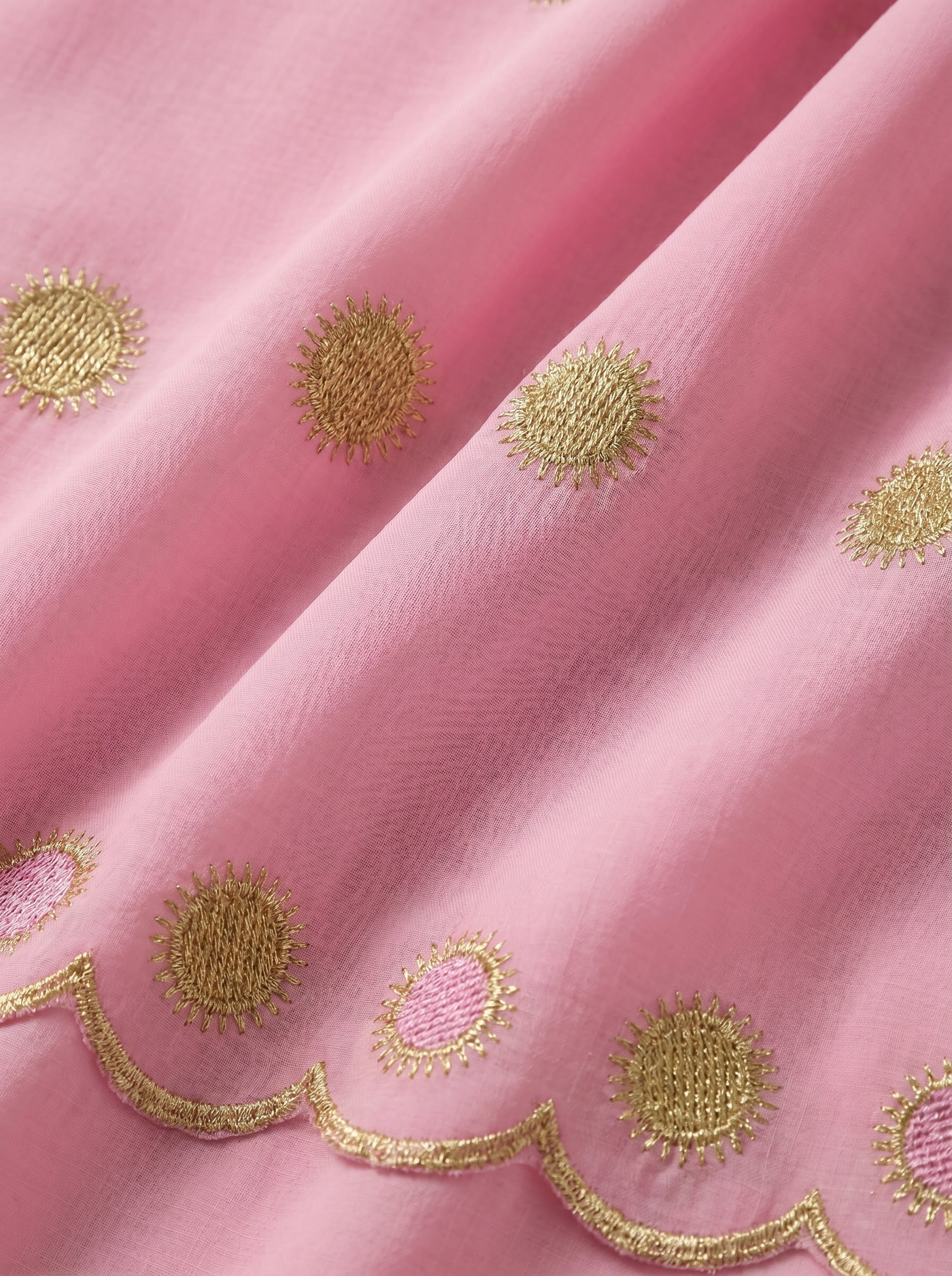 Soft pink Swiss voile with signature sunburst embroidery