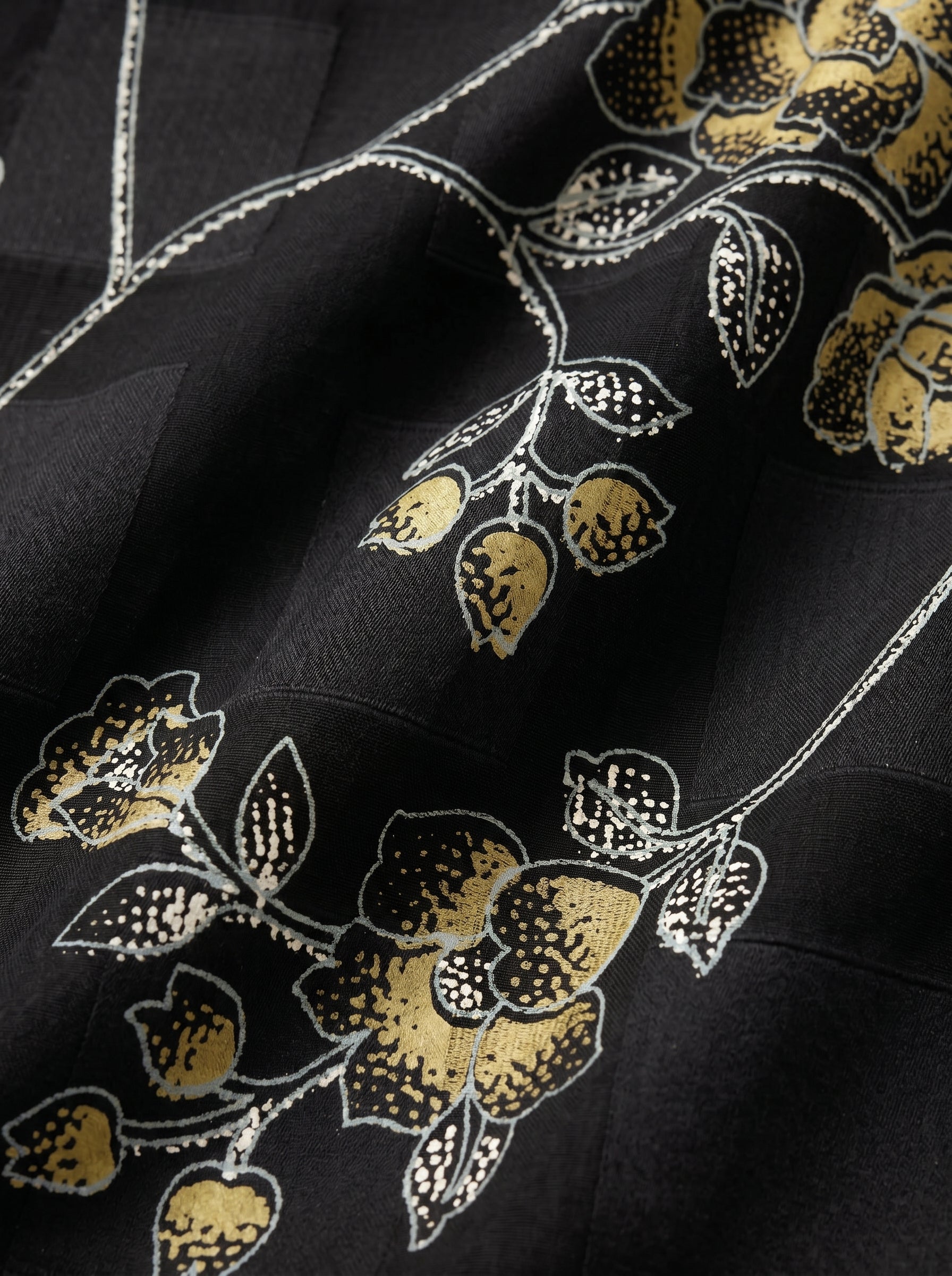 Golden forest florals on deep black Swiss voile