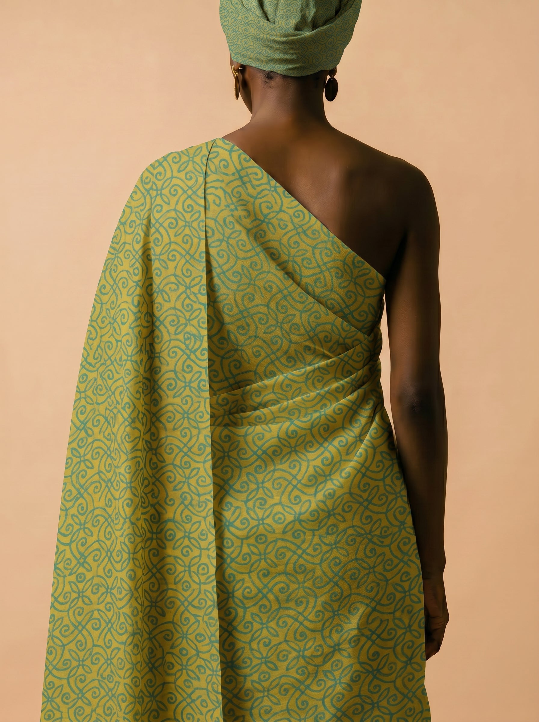 Full-width lime and teal ditsy floral fabric featuring high-density botanical motifs