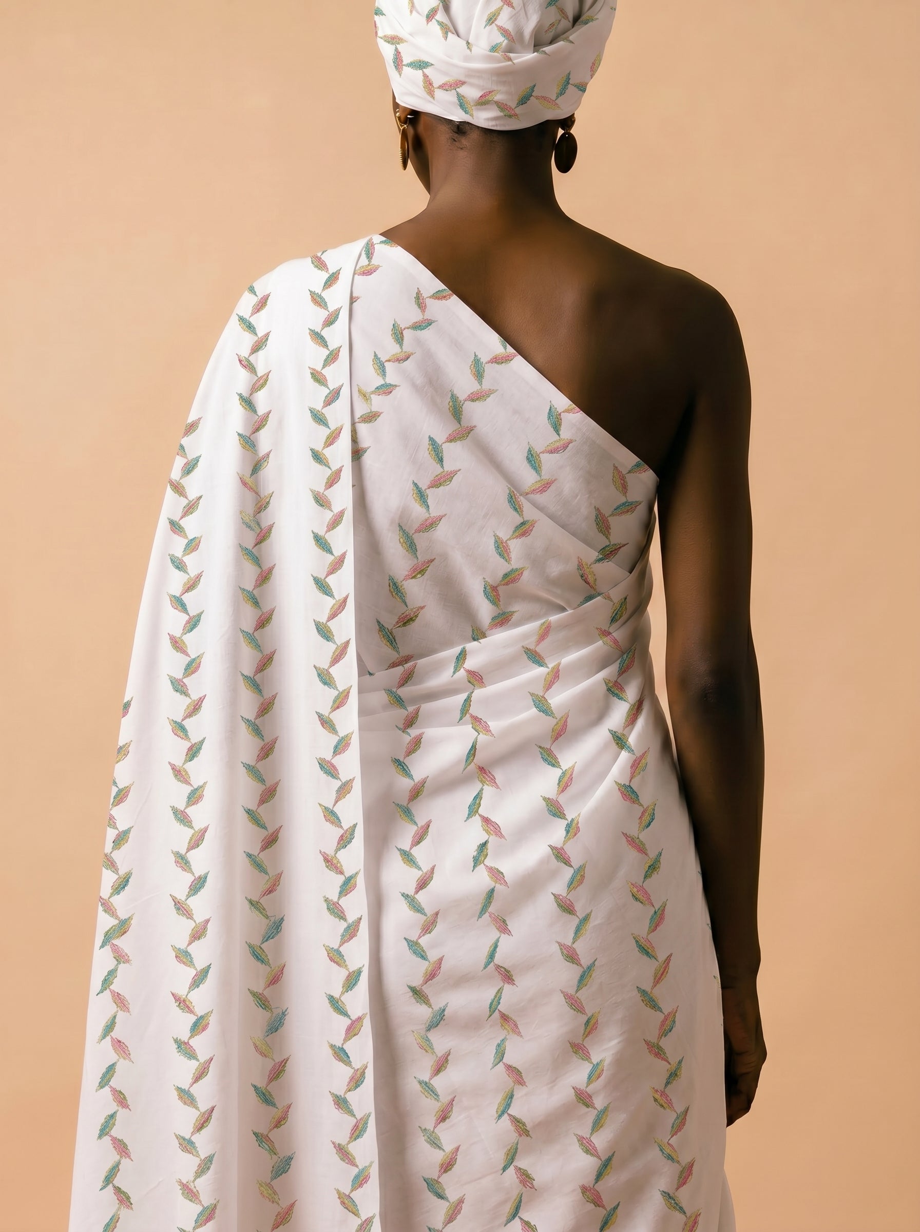 Multicolour embroidery on soft white cotton