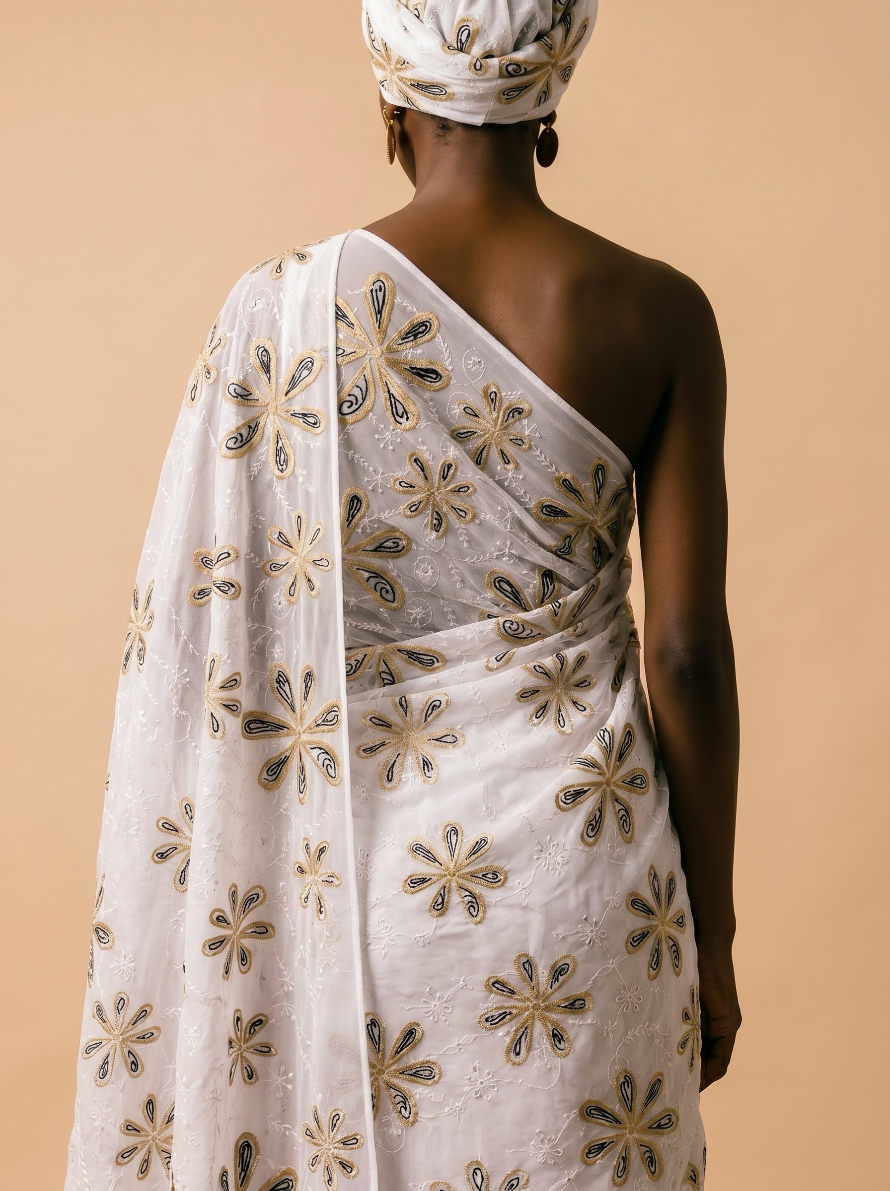 Embroidered motif fabric