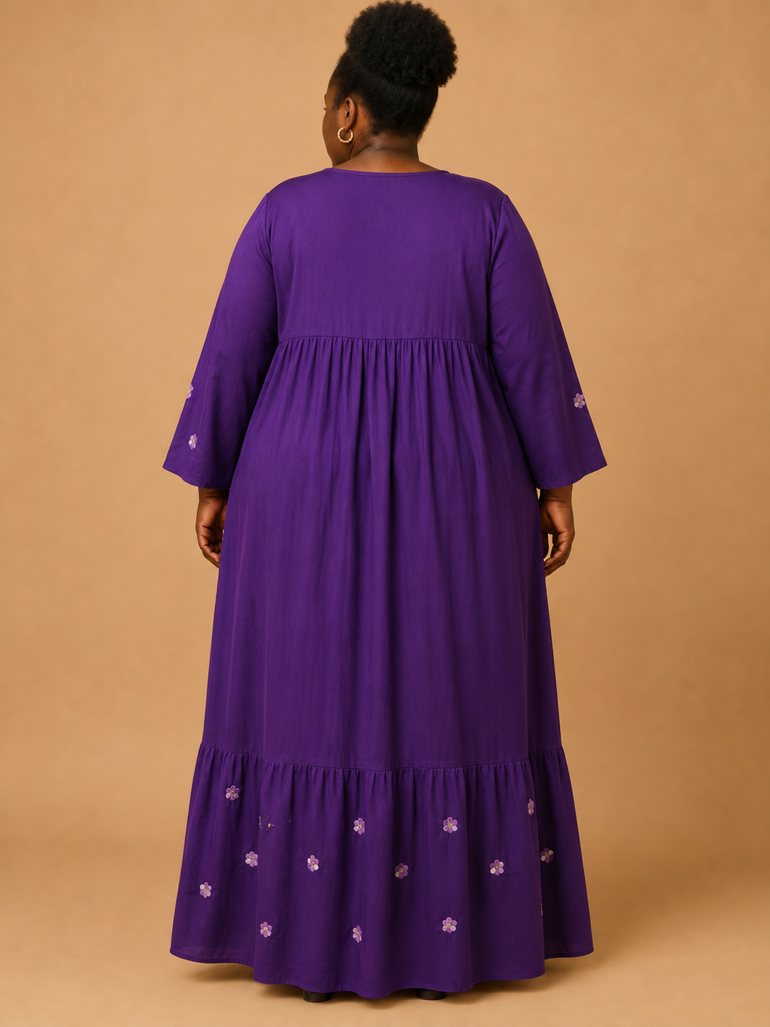 Delicate floral embroidery on a rich royal purple base