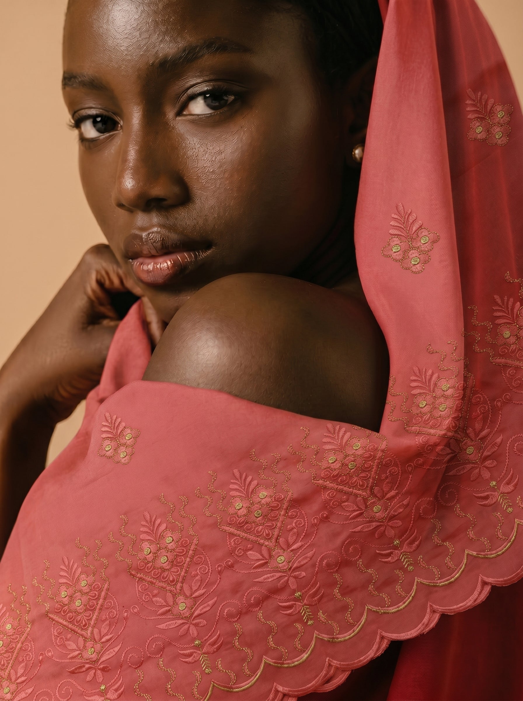 Classic floral embroidery on rich cotton base