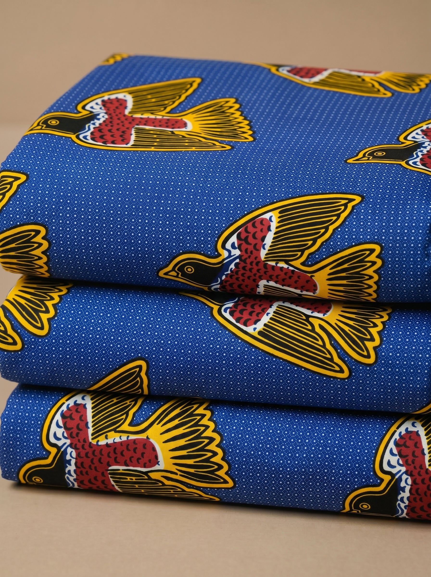Blue bird print with dotted background