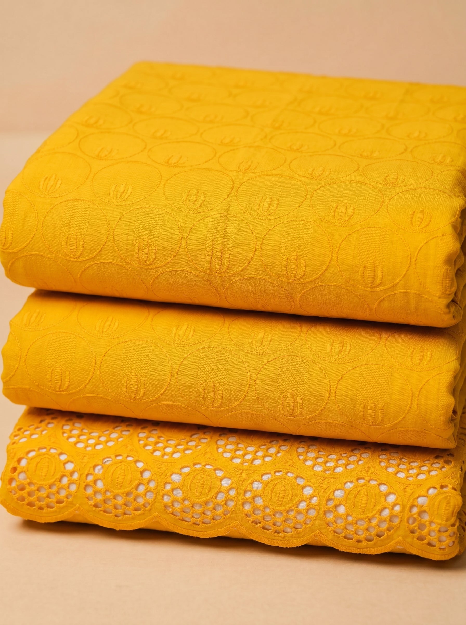 Rich mustard embroidery with heavy cutwork border