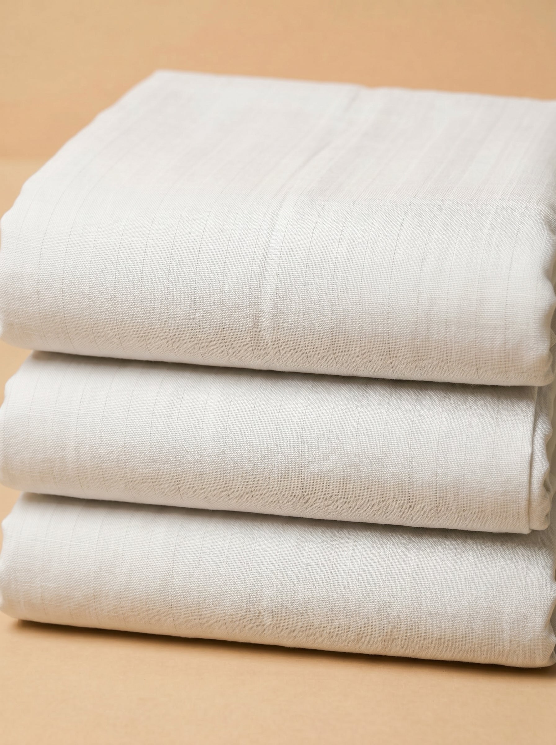 textured weave in soft ivory base