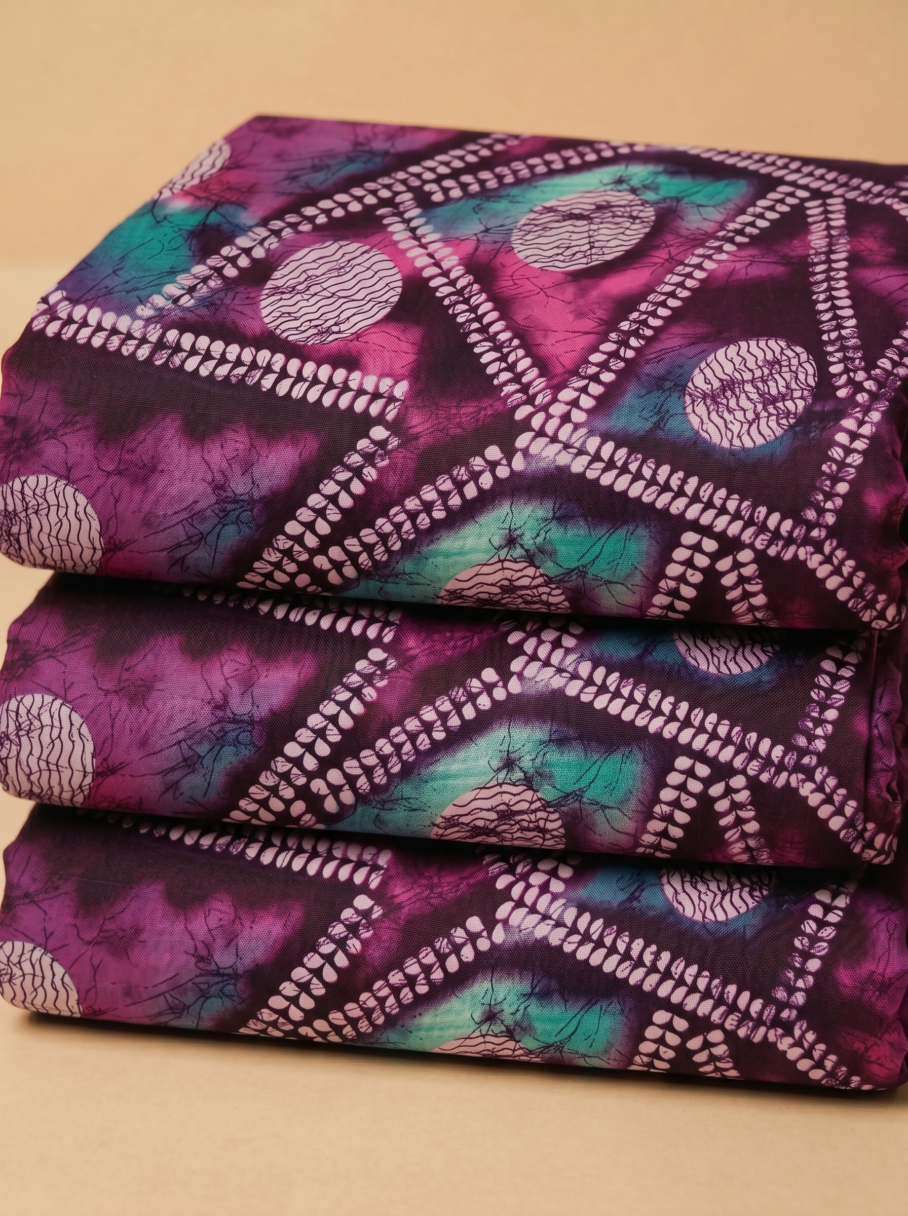 Bold batik abstract on rich satin finish