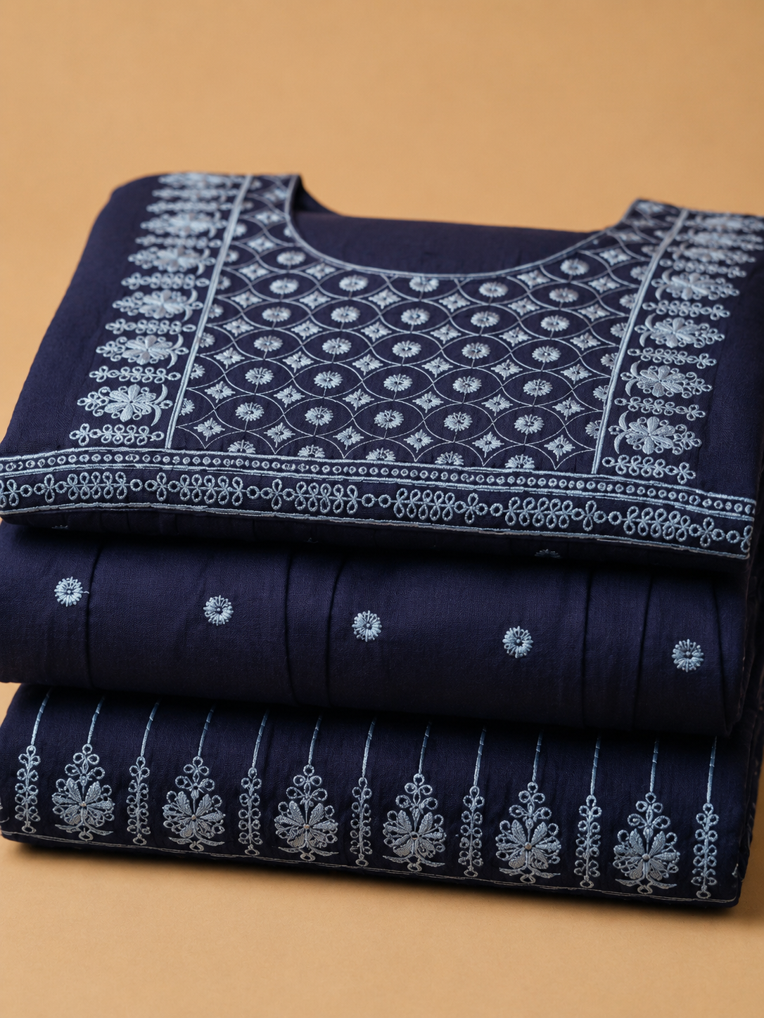 Classic butta embroidery on a rich midnight blue base