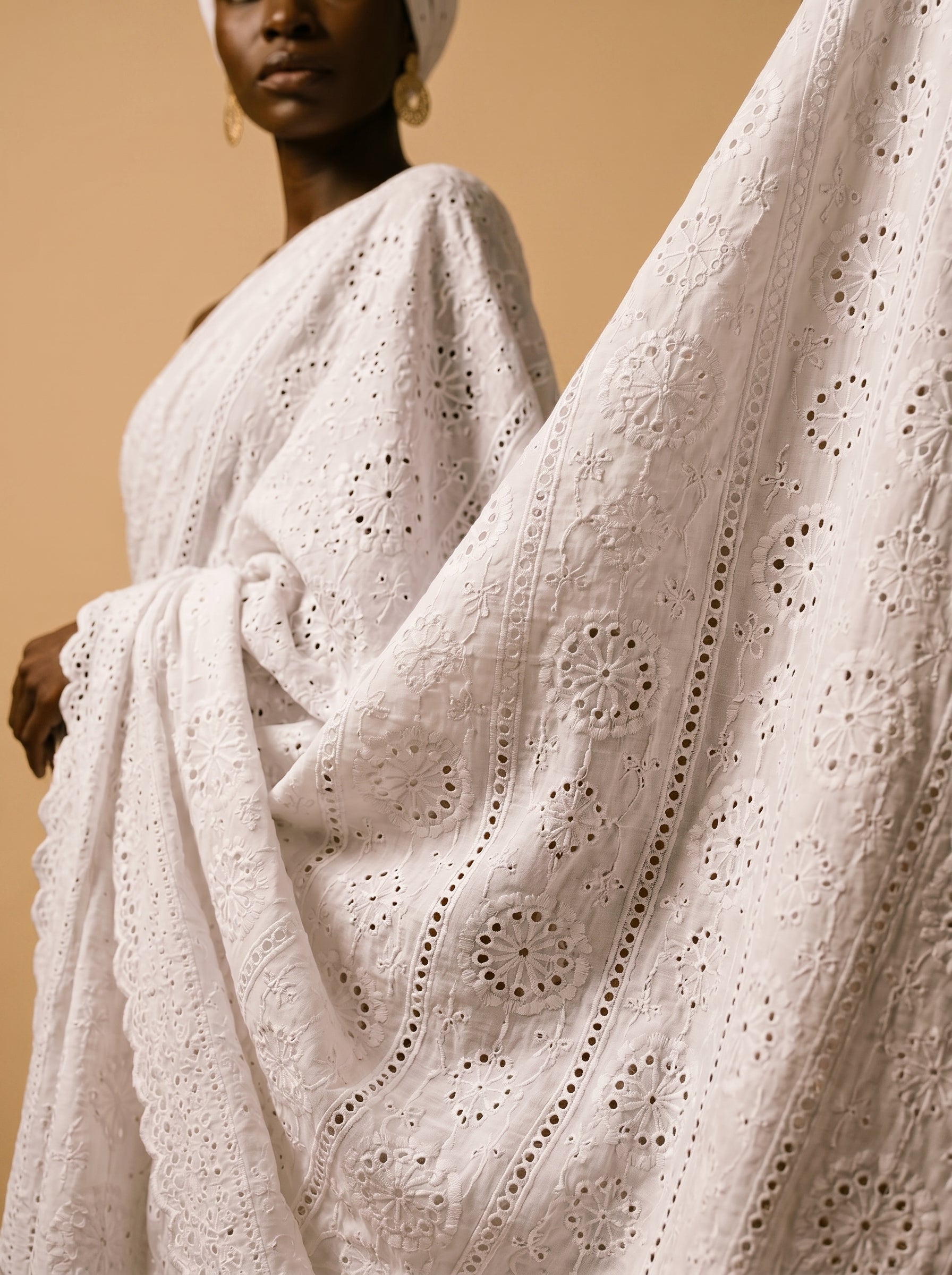 Premium 100% Cotton Chicken fabric featuring delicate cutwork embroidery and scalloped edges
