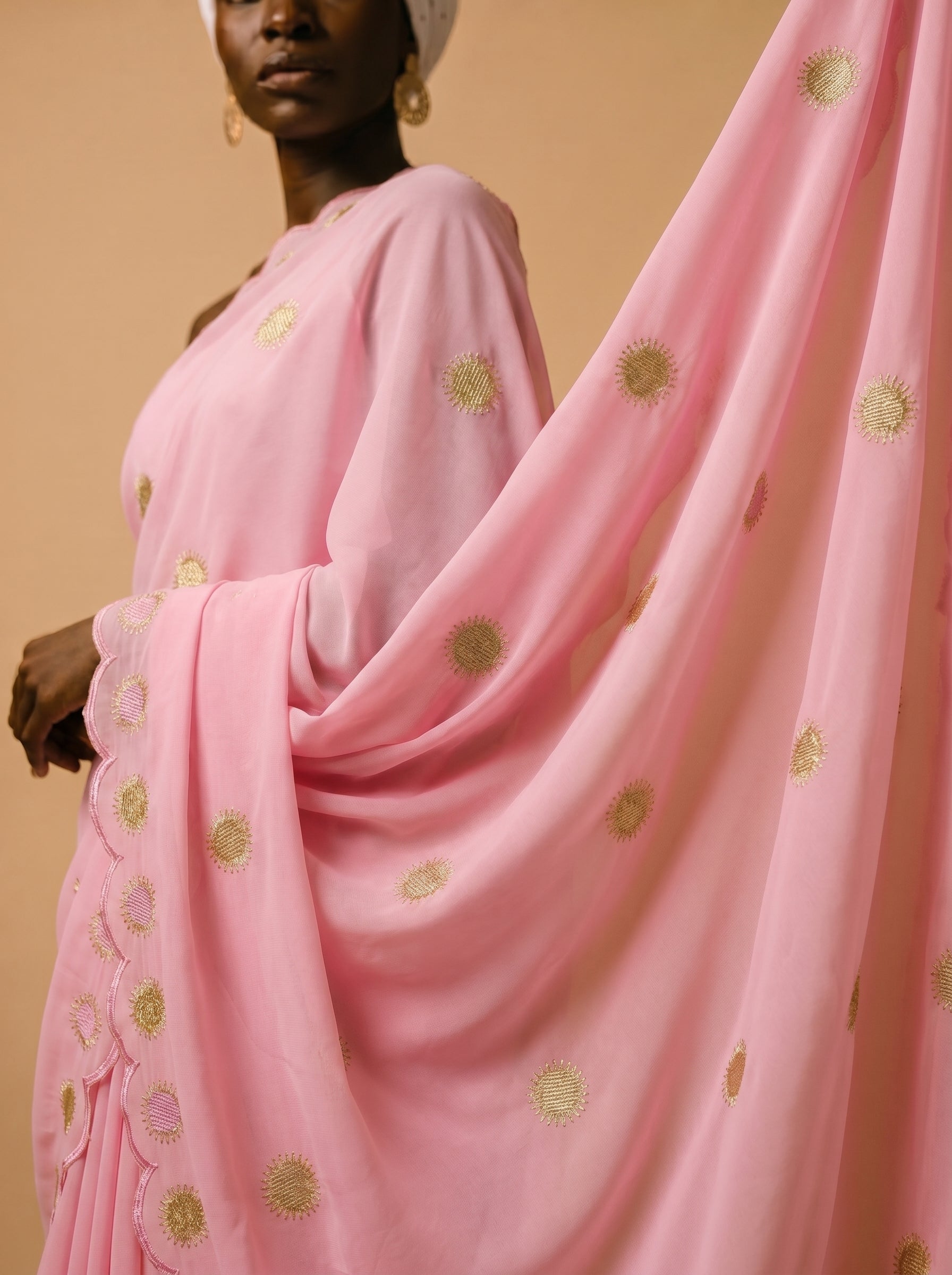 Soft pink Swiss voile with signature sunburst embroidery