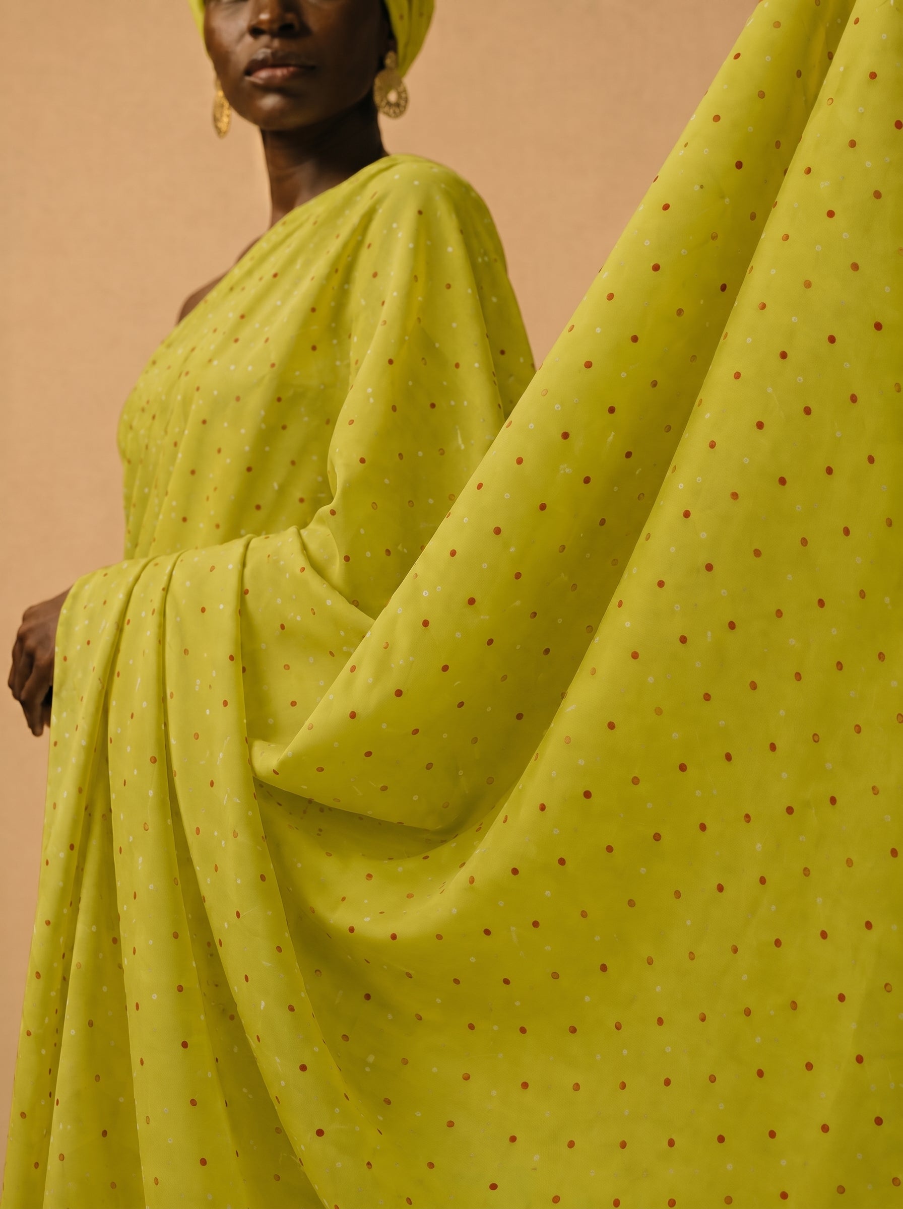 Bright yellow dotted Swiss voile
