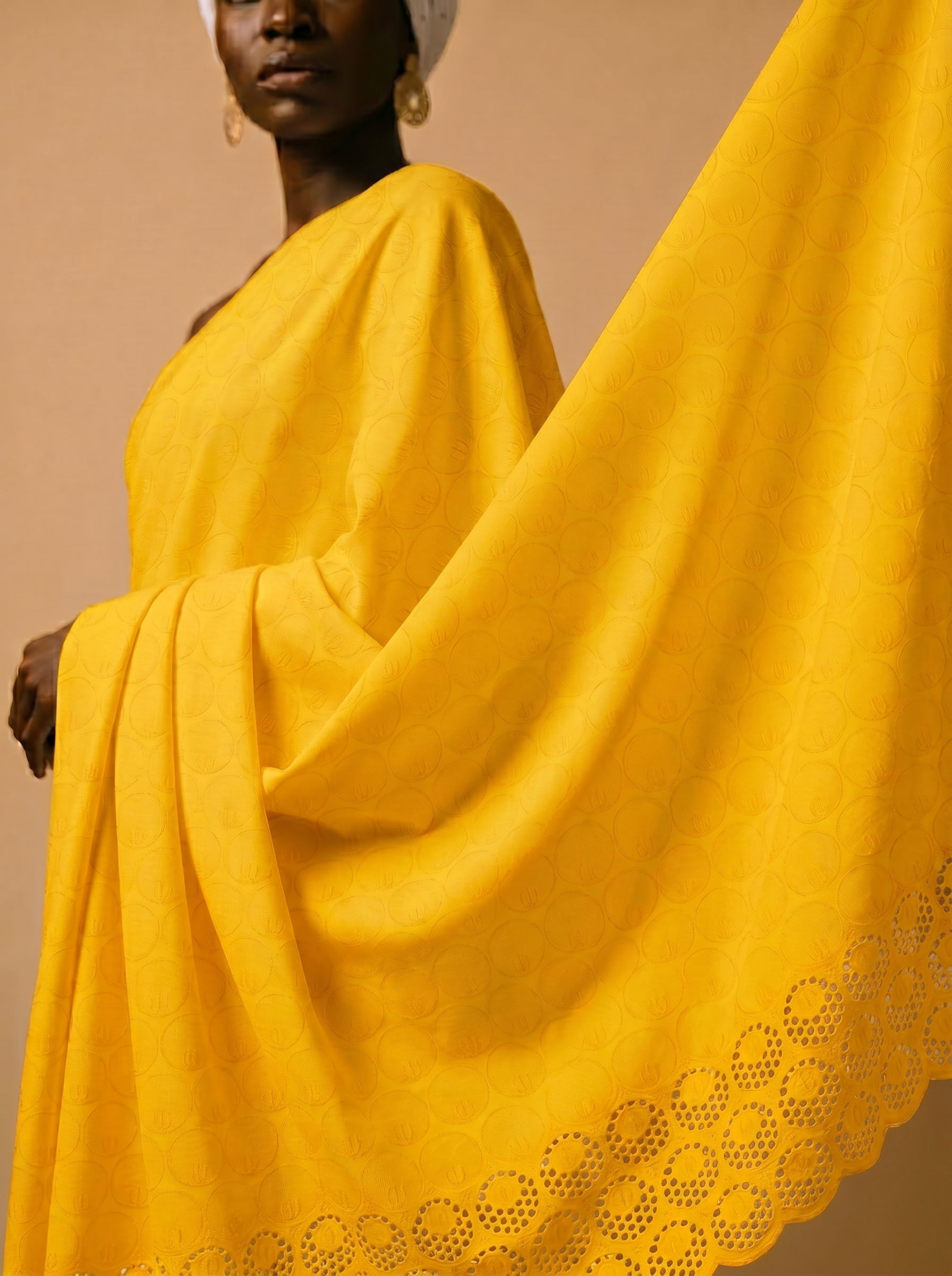 Rich mustard embroidery with heavy cutwork border