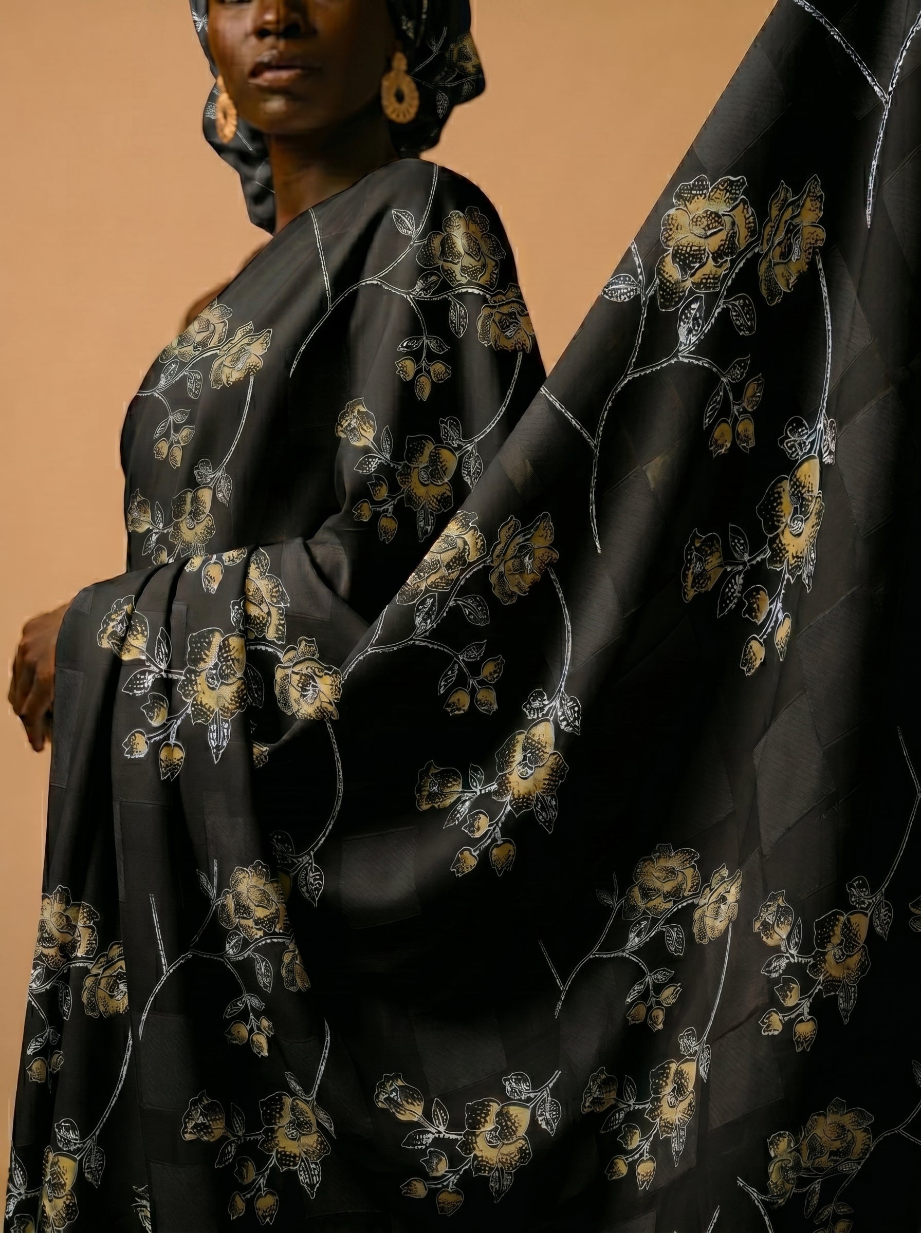 Golden forest florals on deep black Swiss voile