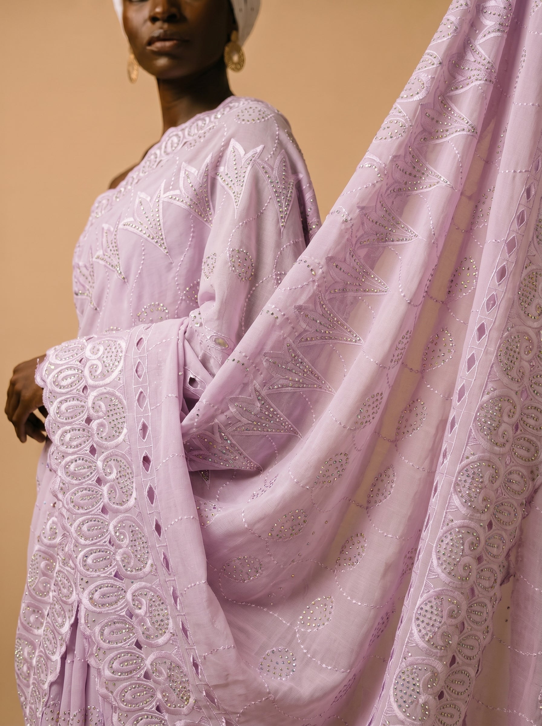 Graceful and glimmering unstitched Swiss Voile from the Lavender Luxe Collection, featuring lush lilac tones