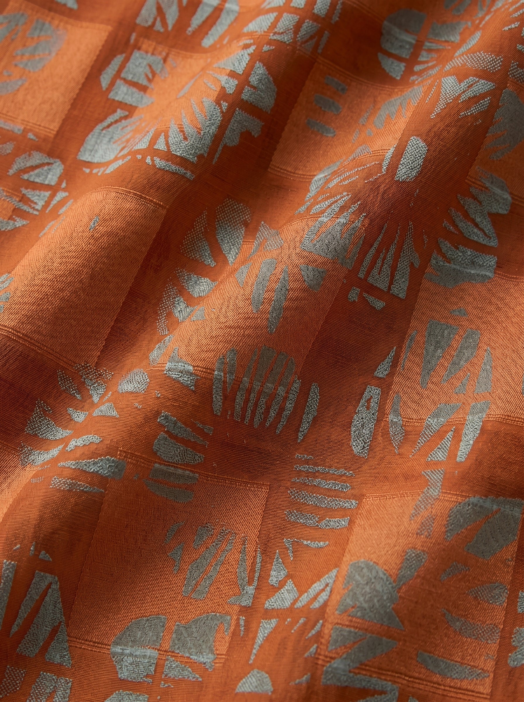 Abstract tropical motifs on a rich rust base