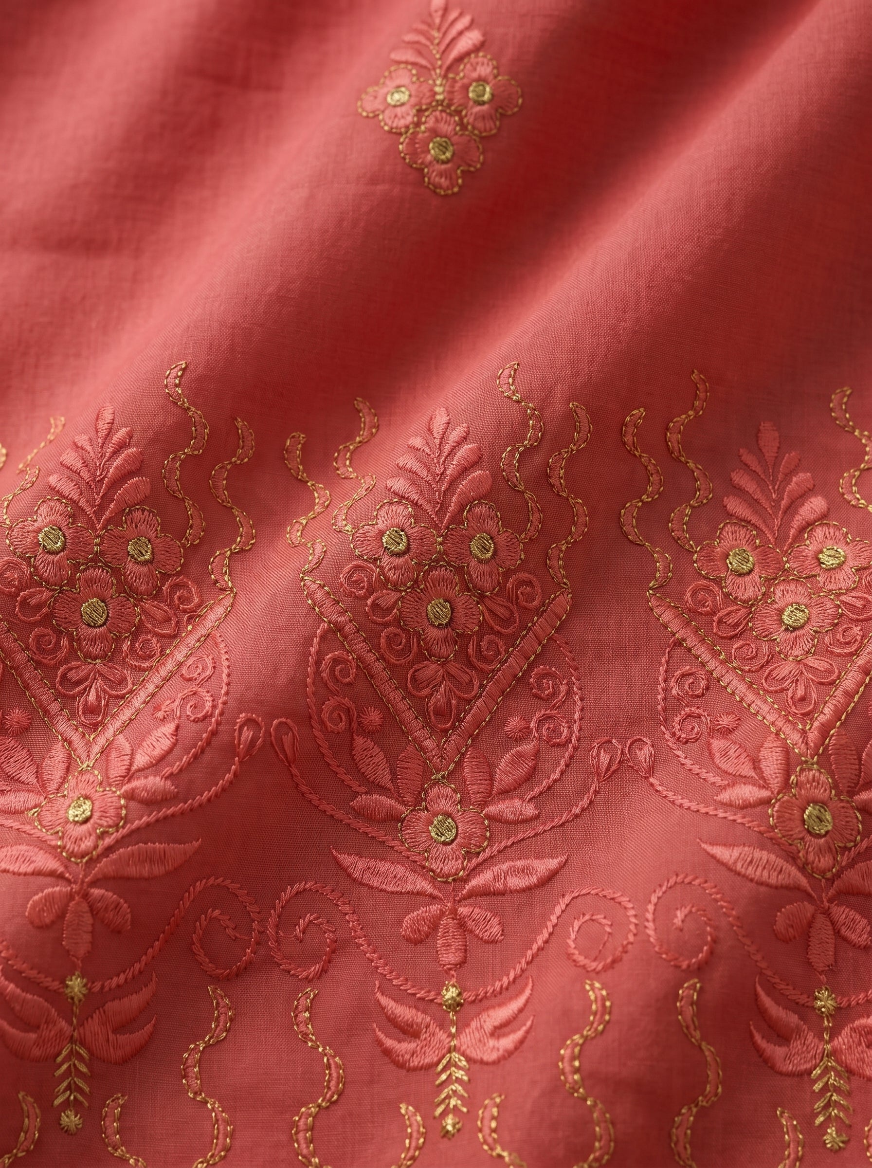 Classic floral embroidery on rich cotton base