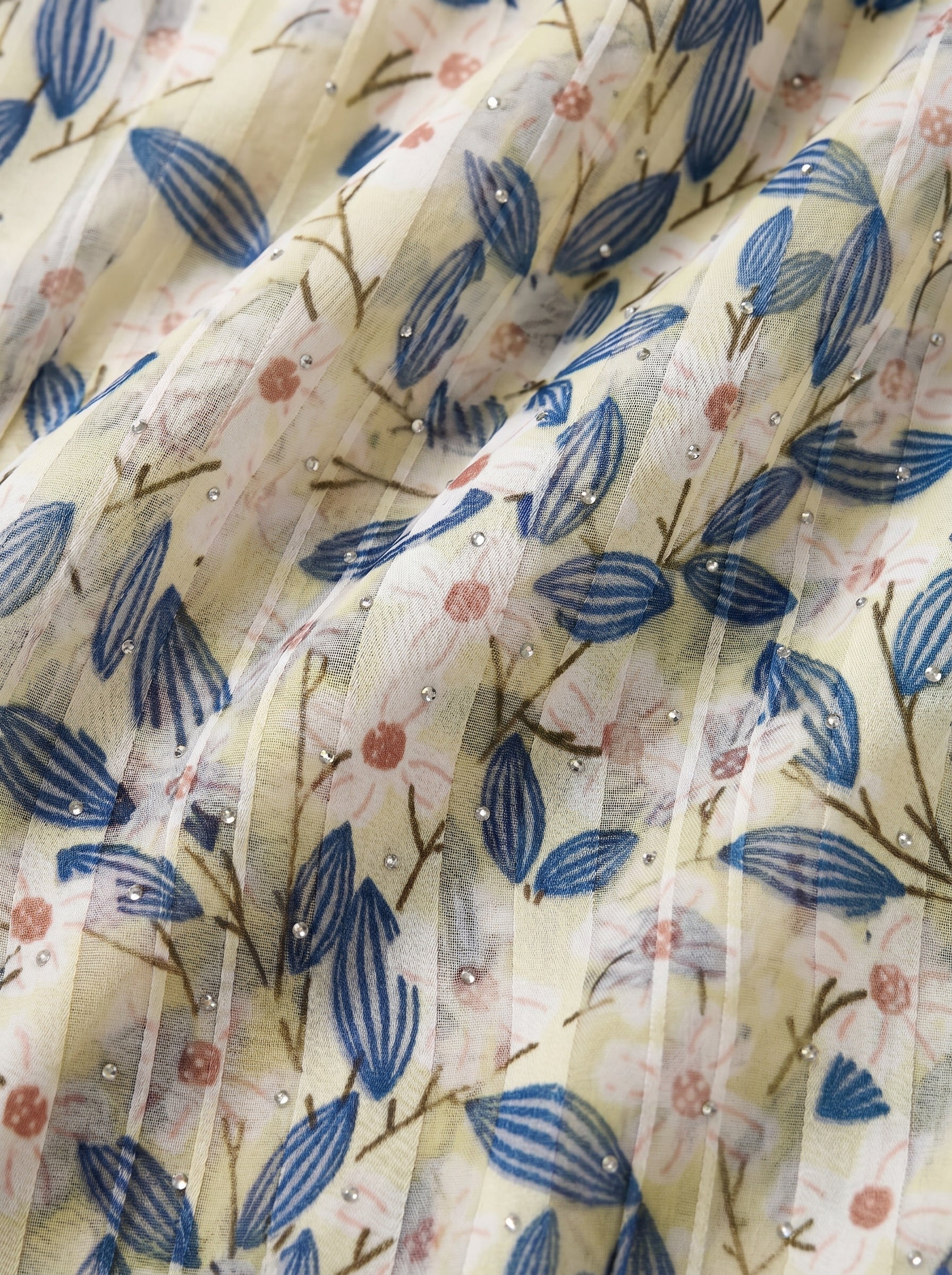 Muted floral-leaf print with soft elegance