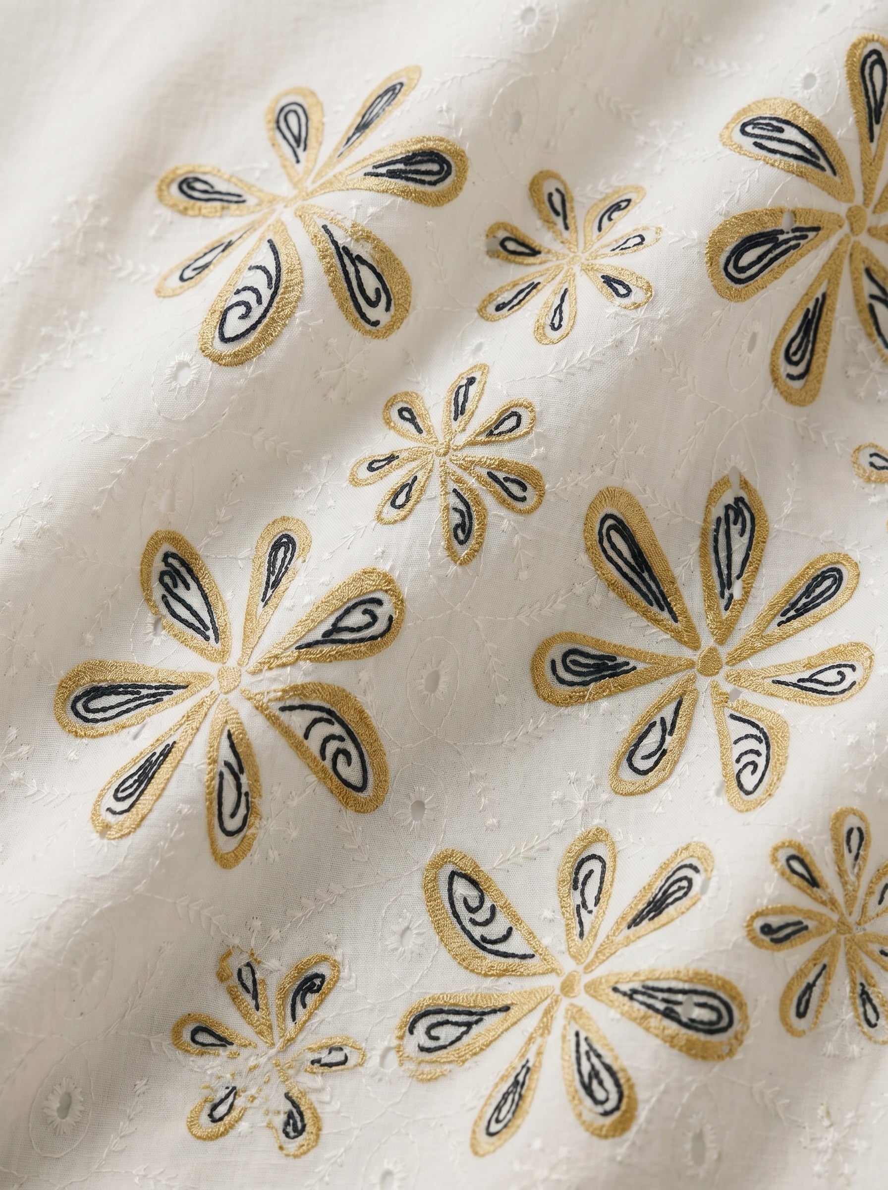Embroidered motif fabric