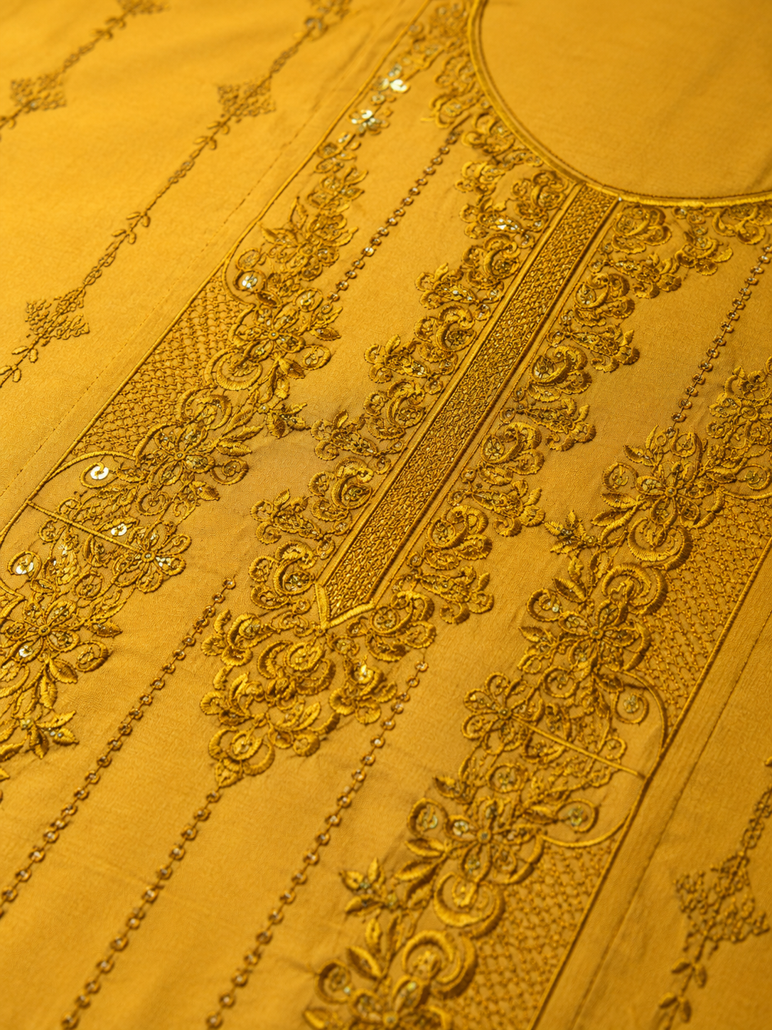 Elegant embroidery on a rich golden base