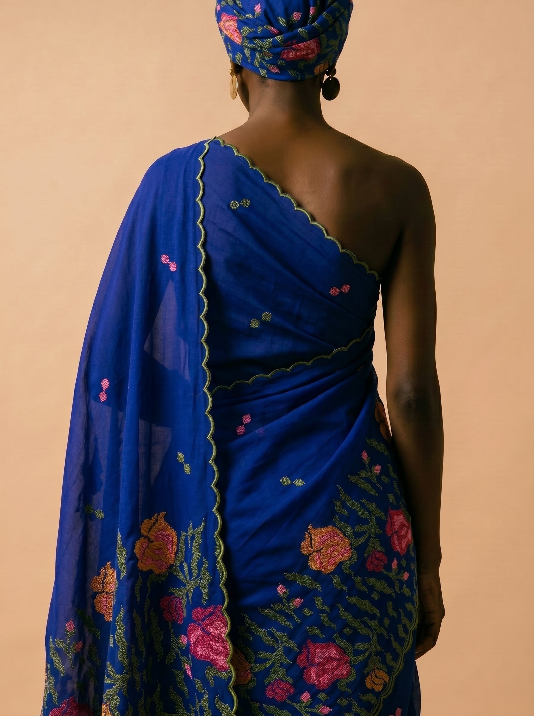 Royal blue threadwork fabric with classic detailing