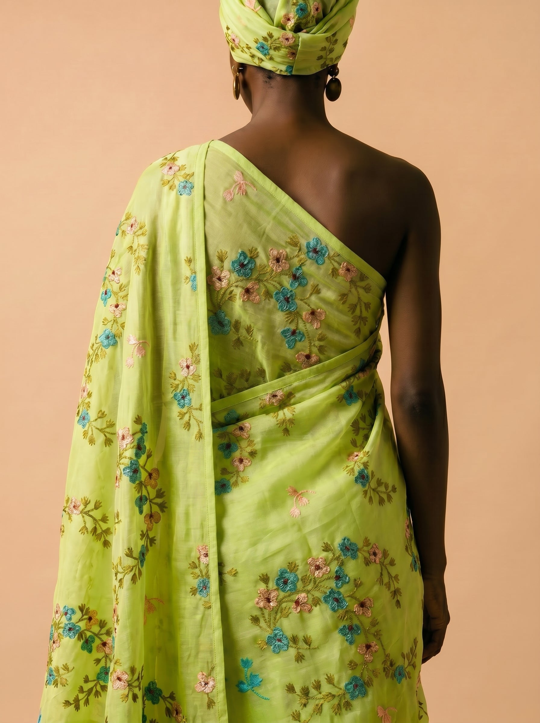 Fresh lime base with delicate floral embroidery