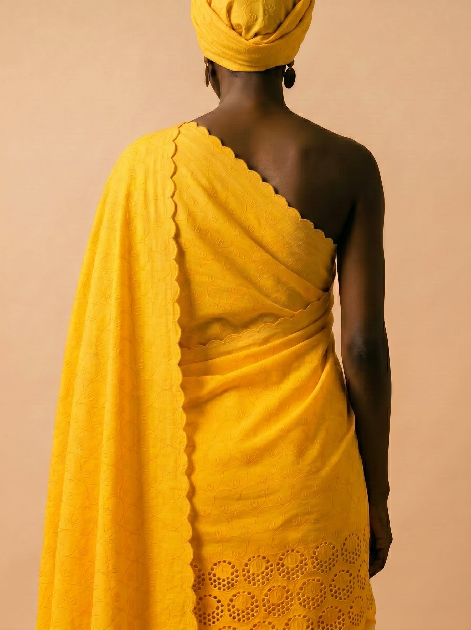 Rich mustard embroidery with heavy cutwork border