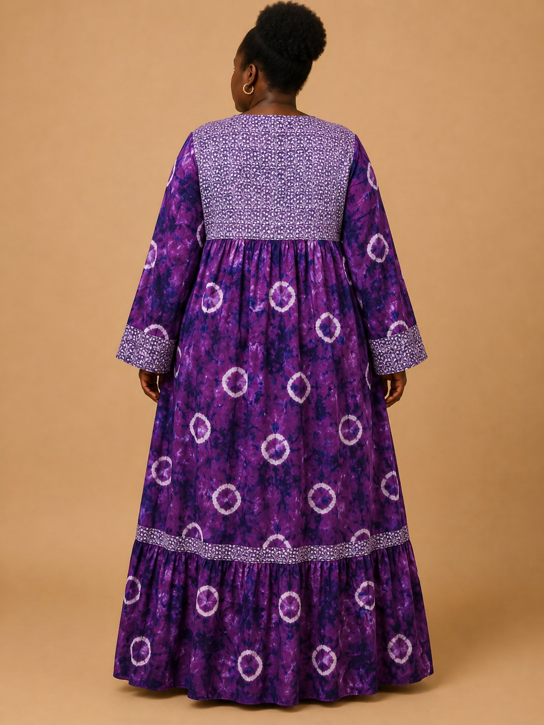 Tie-dye circles on a rich violet base