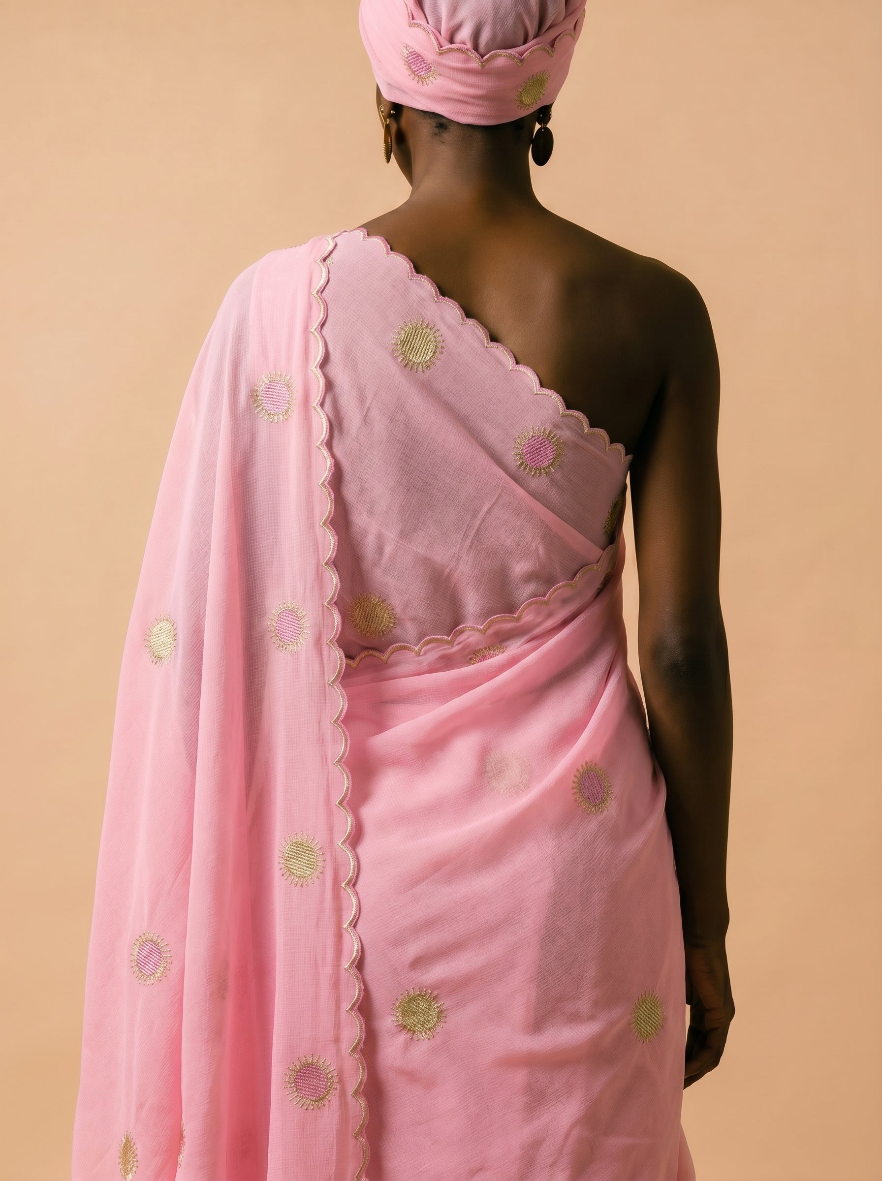 Soft pink Swiss voile with signature sunburst embroidery