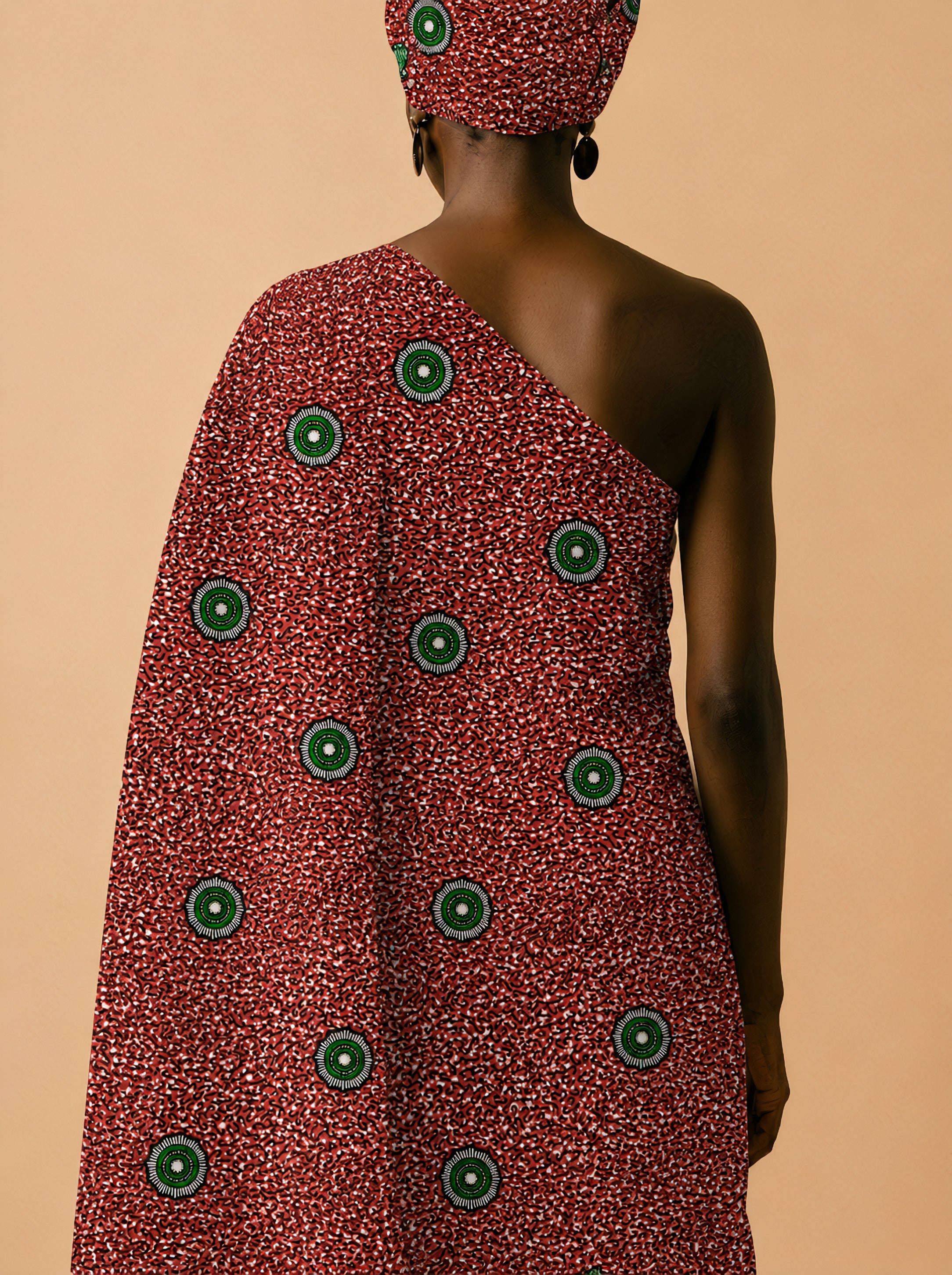 Emerald eyes on a fiery red canvas