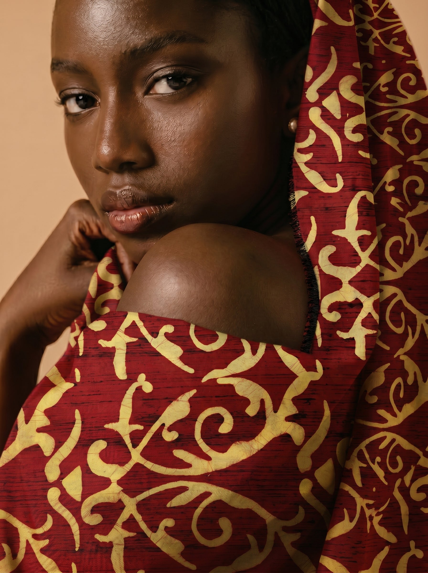 Earthy batik swirls on rich maroon