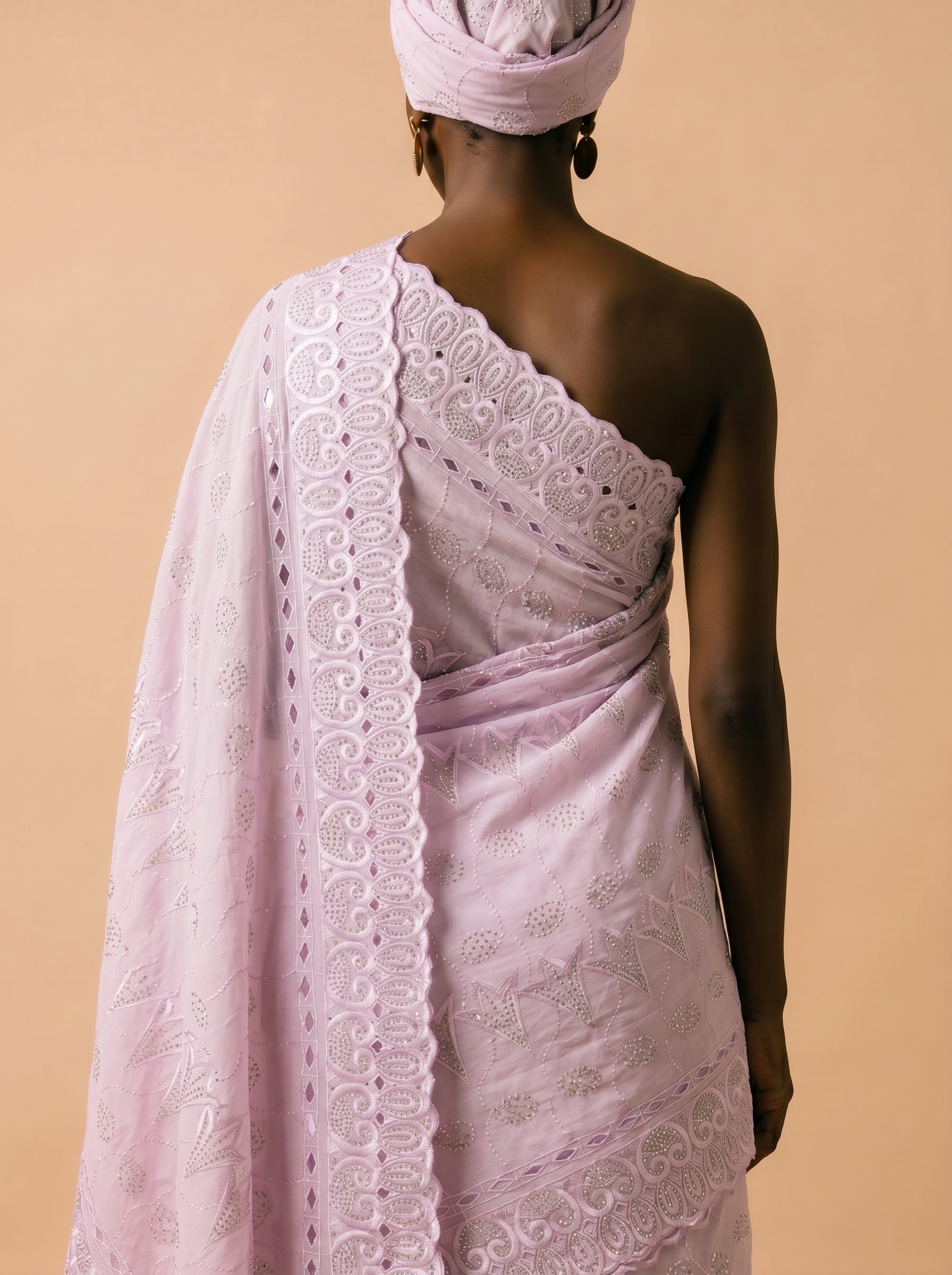 Graceful and glimmering unstitched Swiss Voile from the Lavender Luxe Collection, featuring lush lilac tones