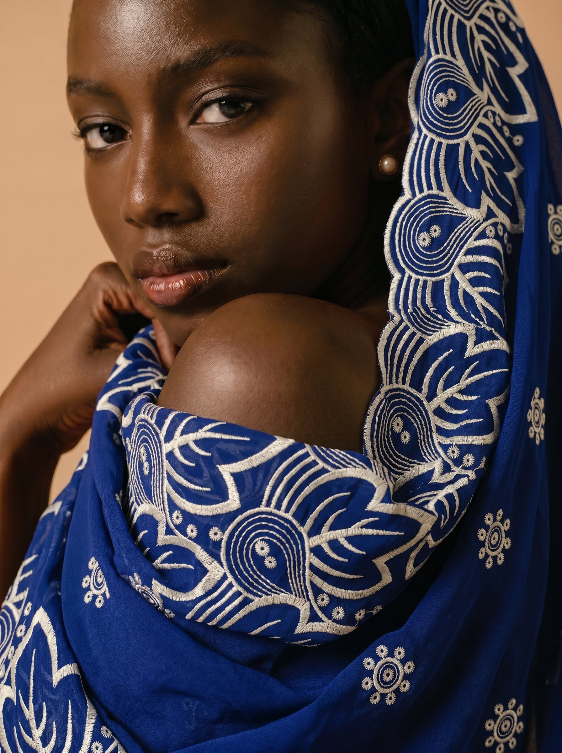 Bold floral border on rich royal blue base