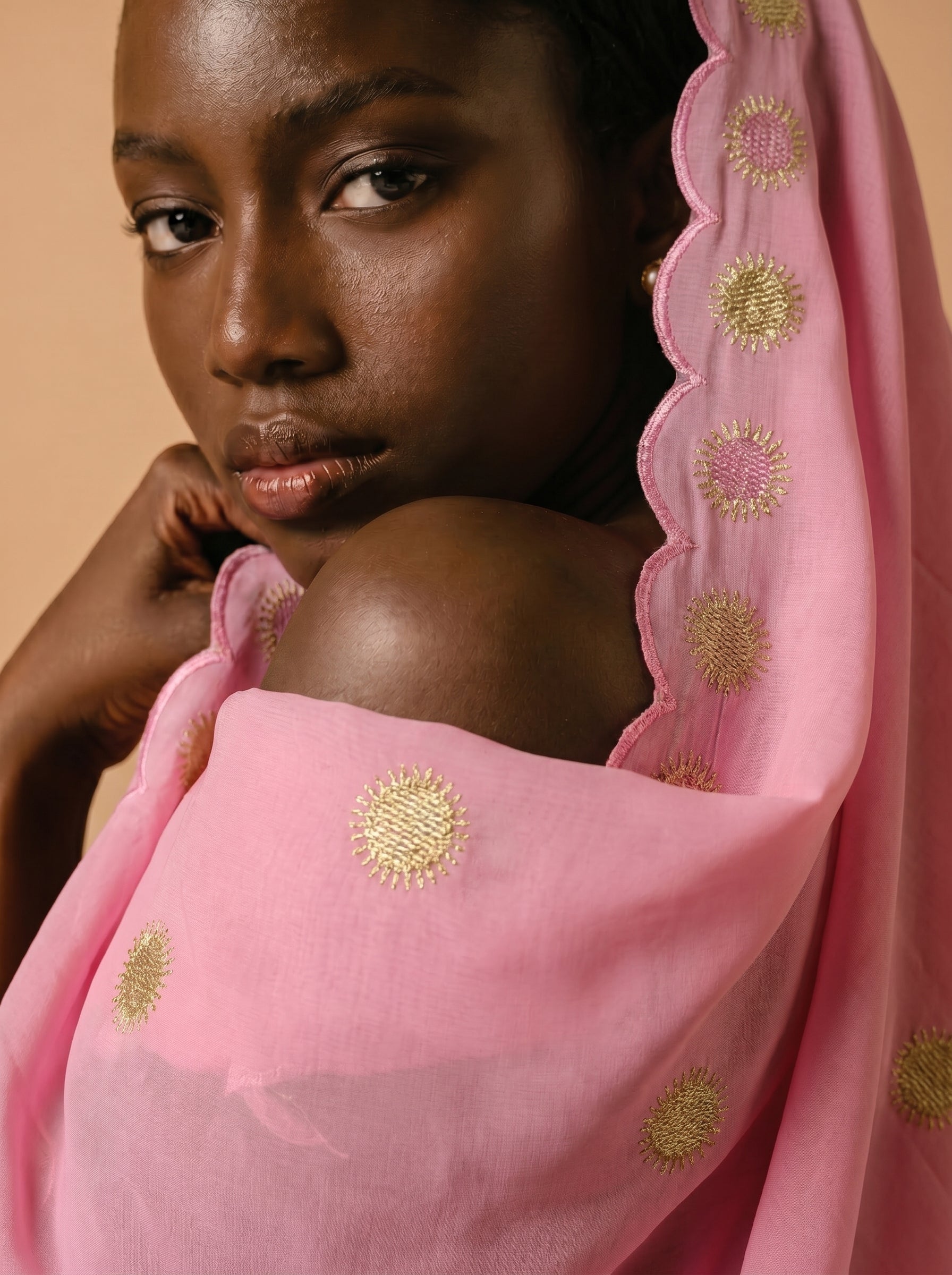 Soft pink Swiss voile with signature sunburst embroidery