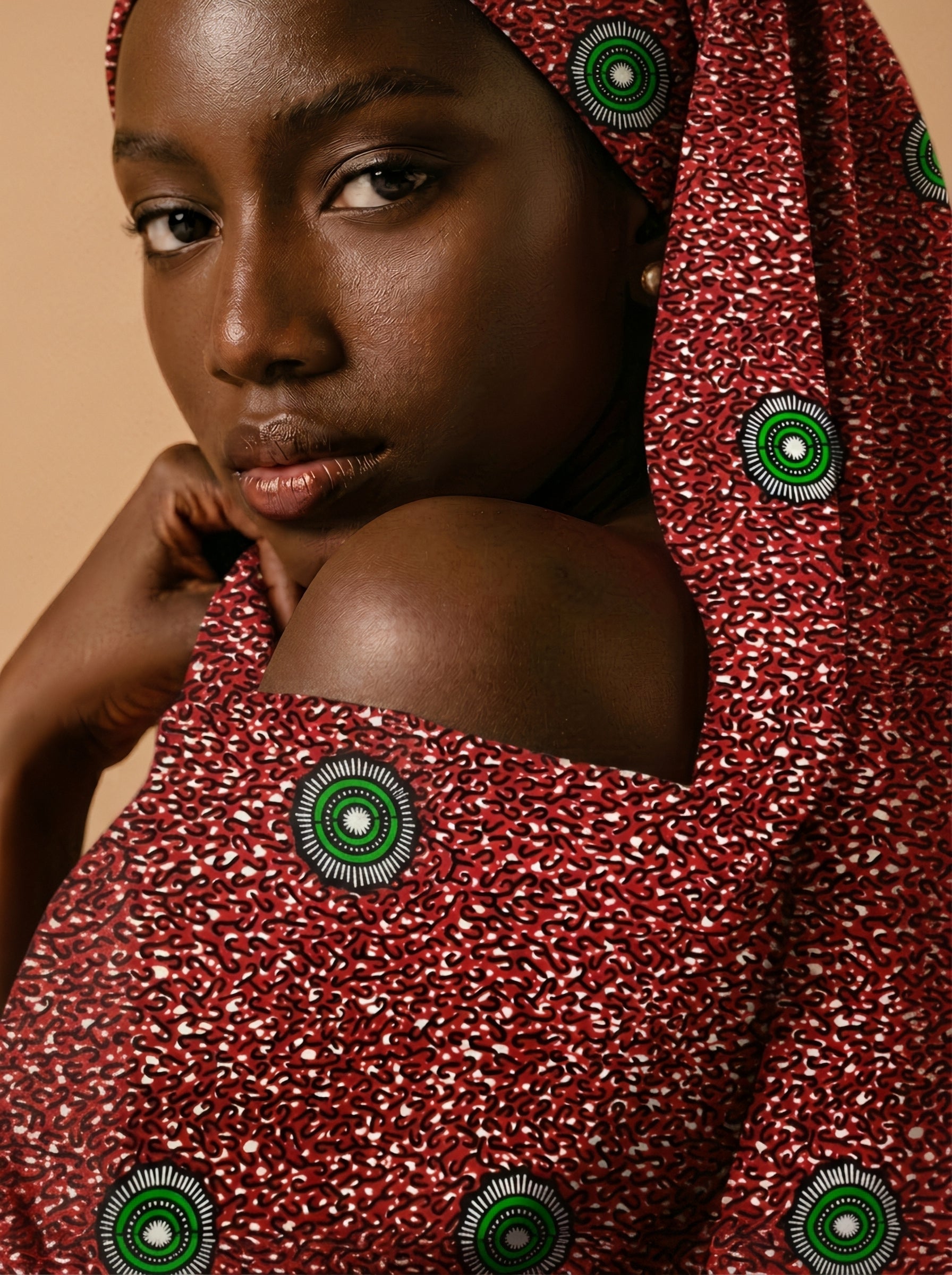 Emerald eyes on a fiery red canvas
